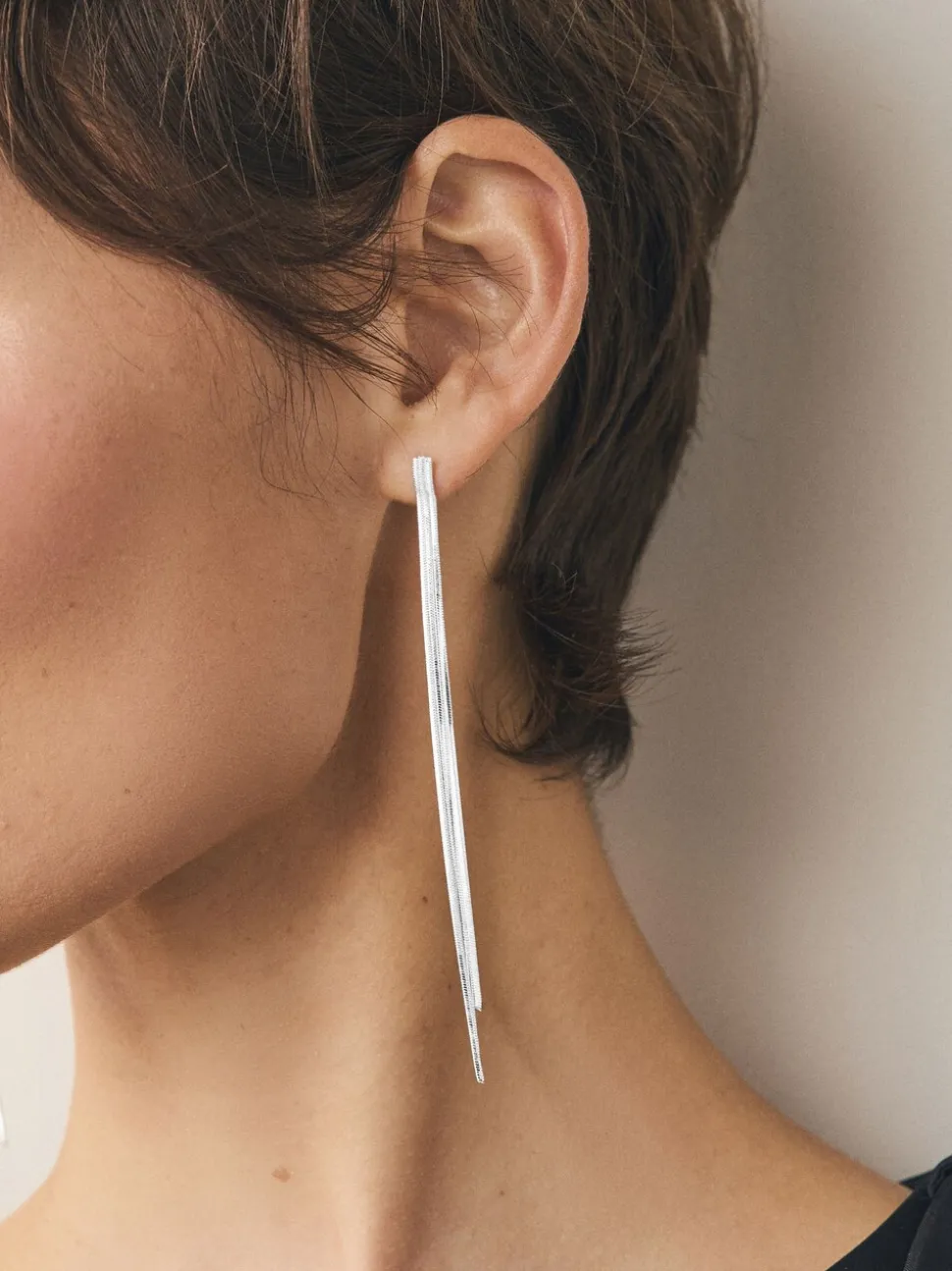 Zilverkleurig - Oorbellen met glinsterende hangers