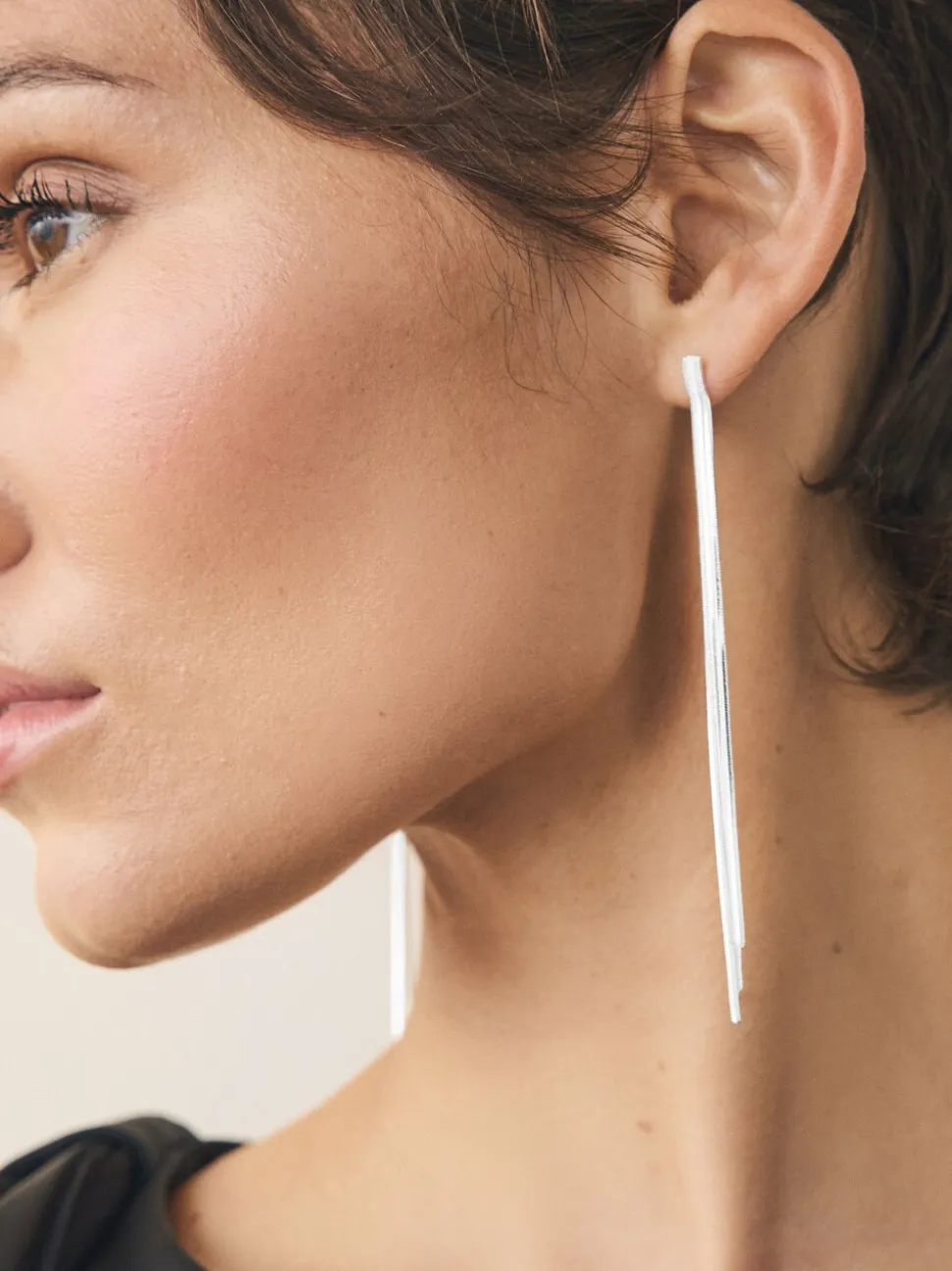 Zilverkleurig - Oorbellen met glinsterende hangers