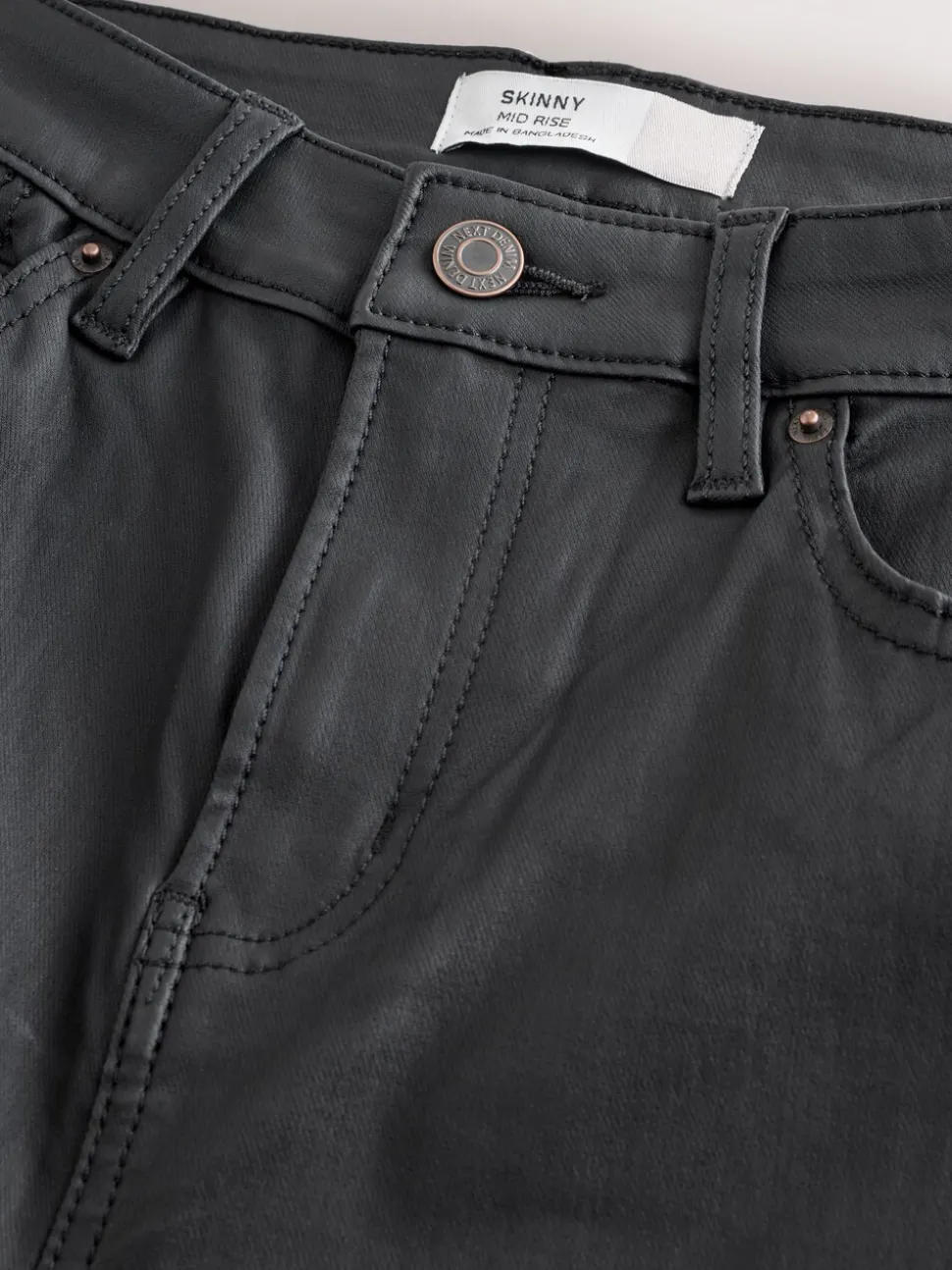 Zwart - Gecoate denim skinny jeans