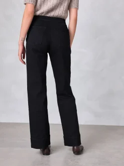 Zwart - Jeans met wijde pijpen en gouden knopen aan de voorkant