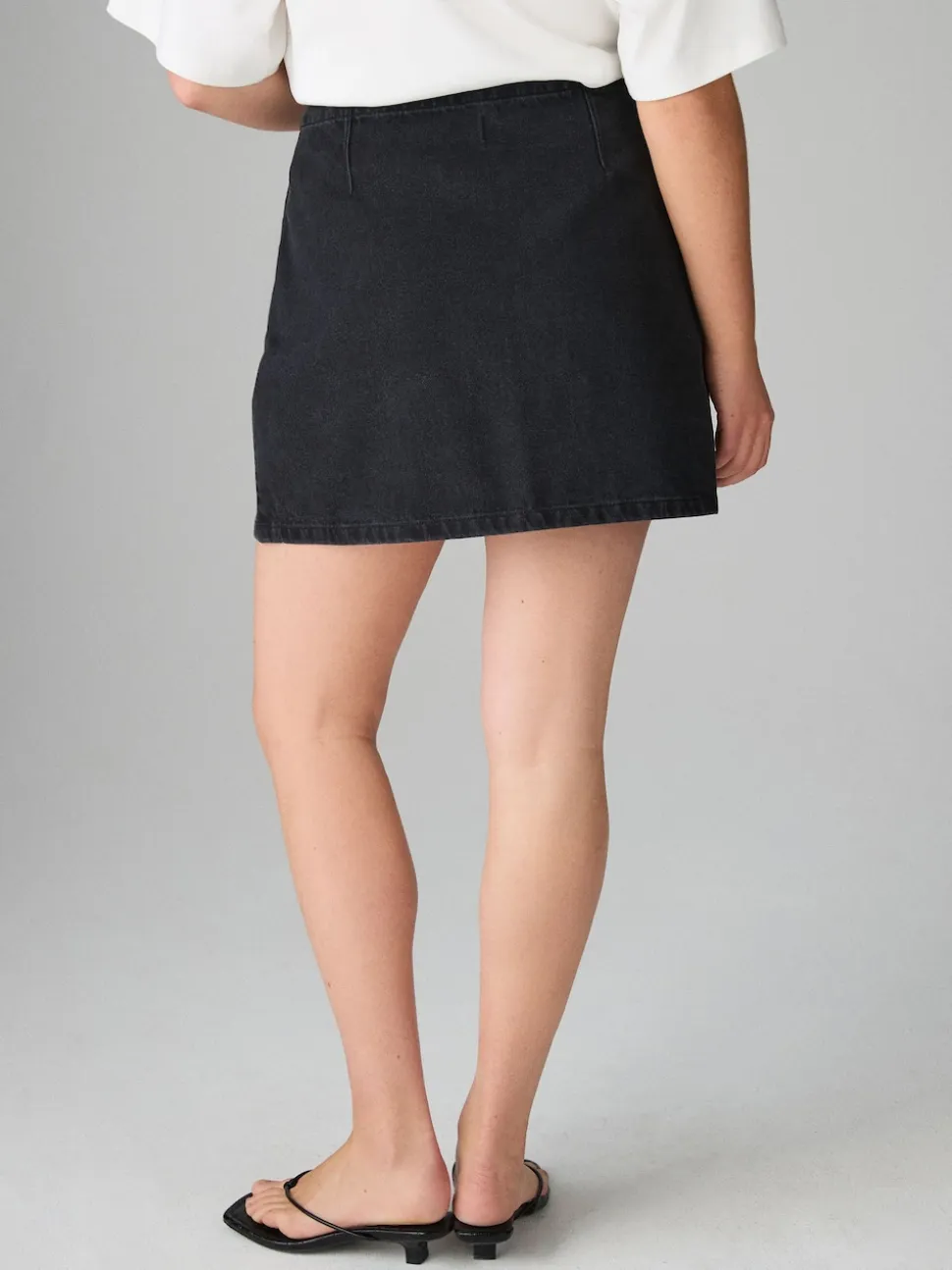 Zwart - Mini denim rok met zandloper model