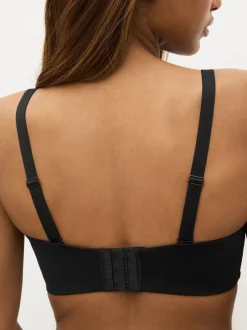Zwart - Minimaliserende strapless bandeaubeha zonder vulling in cupmaat DD+