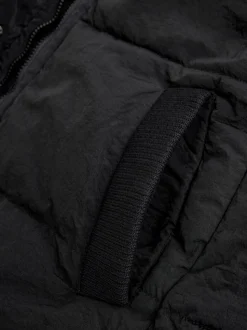 Zwart - Regenbestendige bodywarmer met capuchon en gebreide kraag