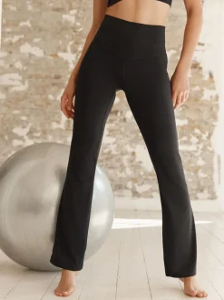 Zwart - Superzachte Dry Tech yogasportleggings met uitlopende pijpen