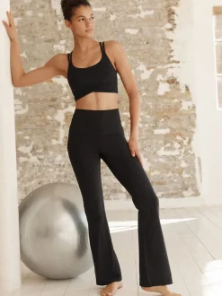 Zwart - Superzachte Dry Tech yogasportleggings met uitlopende pijpen