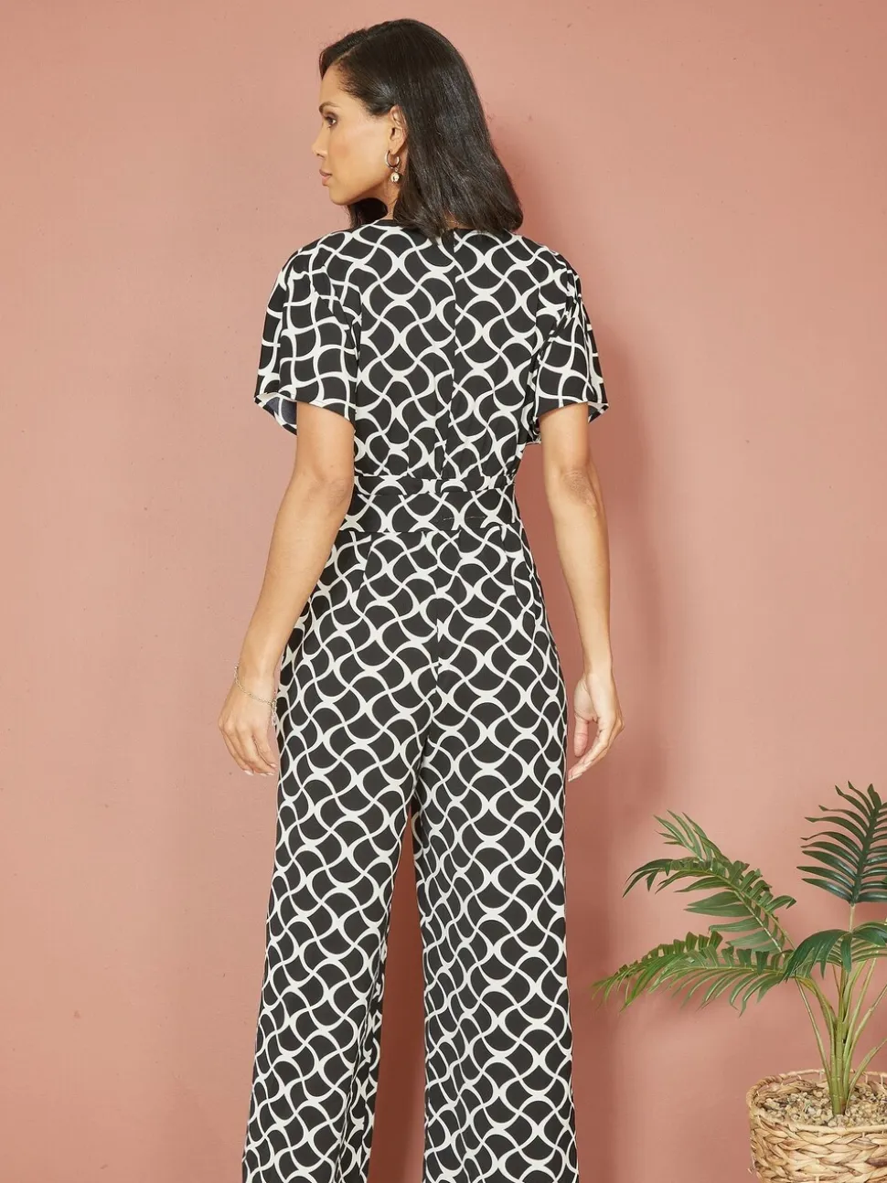 Zwart - Yumi jumpsuit met overslag en geometrische print