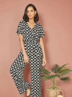 Zwart - Yumi jumpsuit met overslag en geometrische print