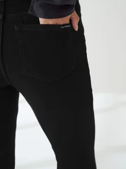 Zwart - Zandloper superzachte jeans met uitlopende pijpen