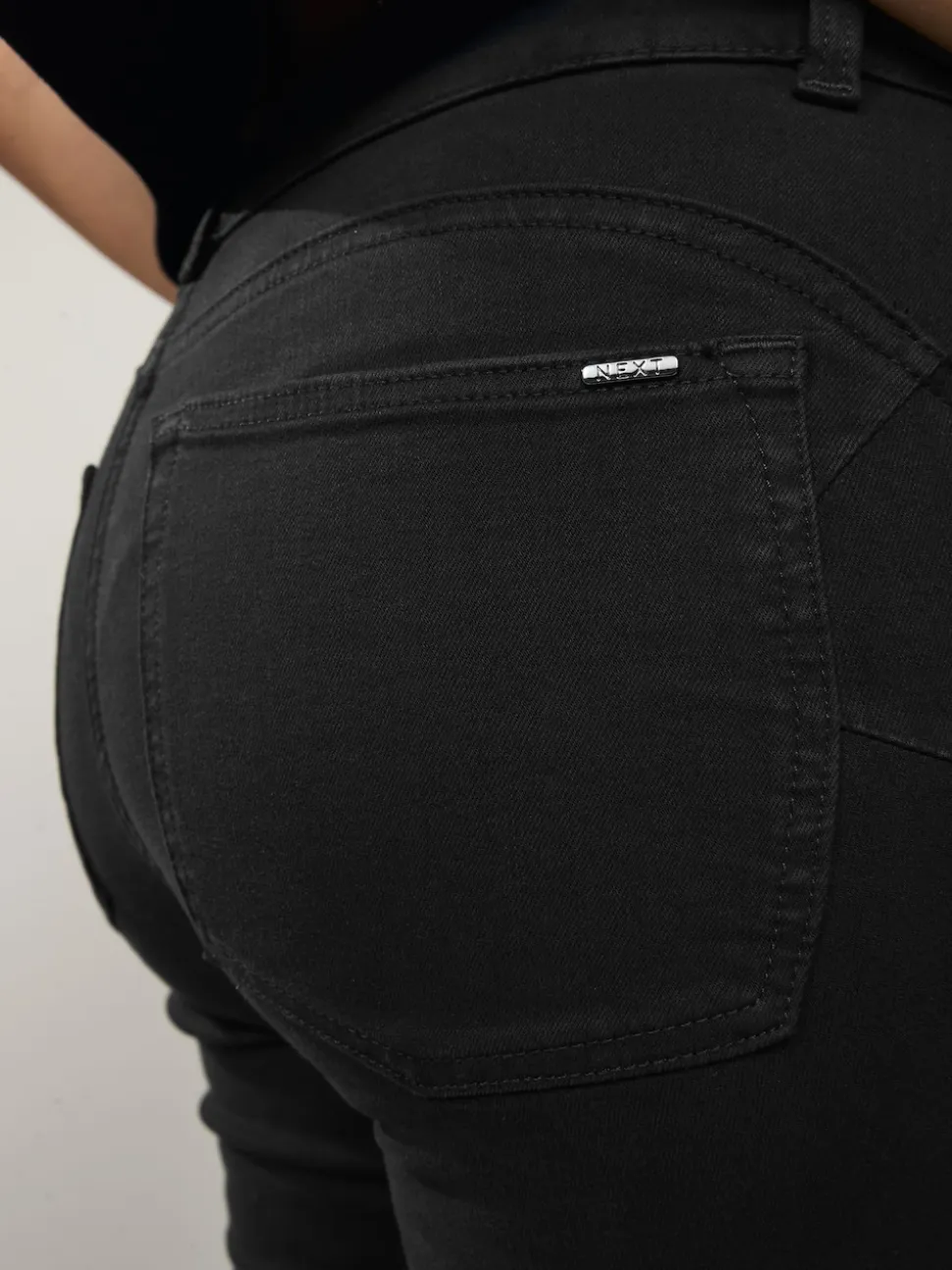 Zwart net - Figuurvormende slim jeans