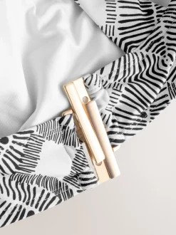 Zwart/crème met aztekenprint - Asymmetrische bikinitop met kralen