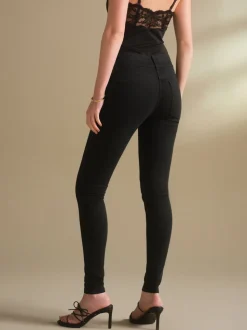 Zwarte wassing - Skinny jeans met verlengings- en afslankeffect