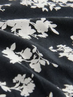 Zwart/wit met bloemenprint - 4 Katoenen slipjes met logotailleband
