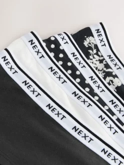 Zwart/wit met bloemenprint - 4 Katoenen slipjes met logotailleband
