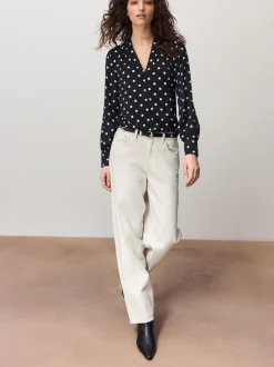 Zwart-wit met stippen - Blouse met V-hals en lange mouwen